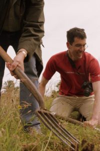 Simon and Dan preparing a plot for the wild flower meadow
